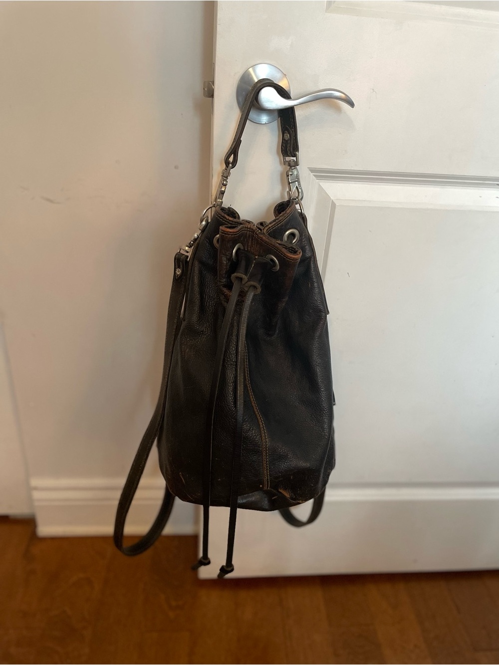 Rugby Black Leather Drawstring Bucket Shoulder Bag and backpack